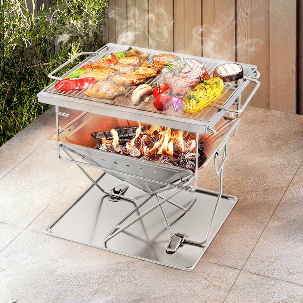 https://assets.mydeal.com.au/2662/grillz-camping-fire-pit-bbq-portable-folding-stainless-steel-stove-outdoor-pits-1173736_00.jpg?v=638326393770982642