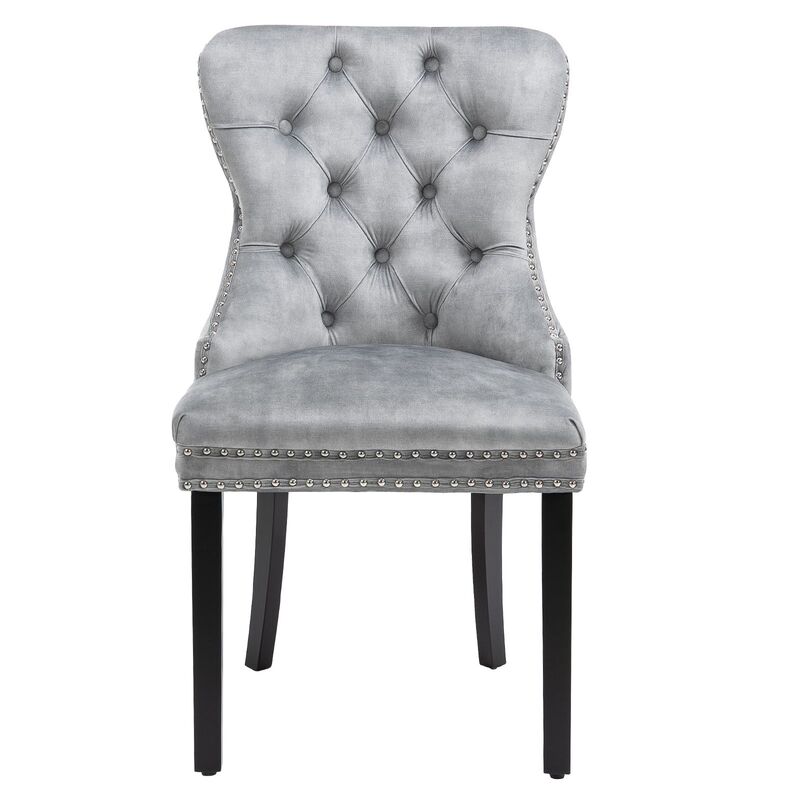 silver tufted chair