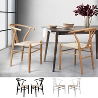 Levede a set of 2 Hans Wegner Wishbone Dining Chairs - Black, White, Natural