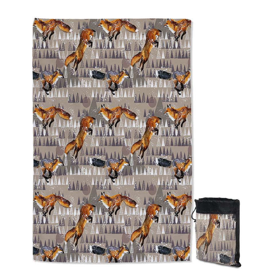 North American Trees Behind Playful Fox Quick Dry Beach Towel