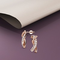 Intertwined Rose Gold Stud Earrings Embellished With SWAROVSKI® Crystals
