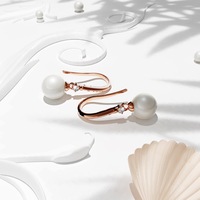 Magnificent Pearl Hook Earrings Embellished With SWAROVSKI® Crystals