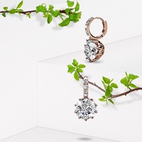 Rose Gold Huggie Earrings Embellished With SWAROVSKI® Crystals
