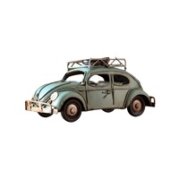 Vintage Diecast Blue Beetle with Spare Wheels on Roof Rack