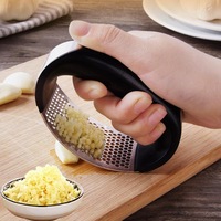 Chef'd Original Garlic Press Rocker - Diced Garlic Within Seconds - Stainless Steel Garlic Mincer Crusher and Peeler