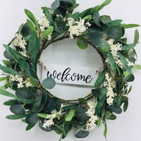Foliage and White Floral Wreath