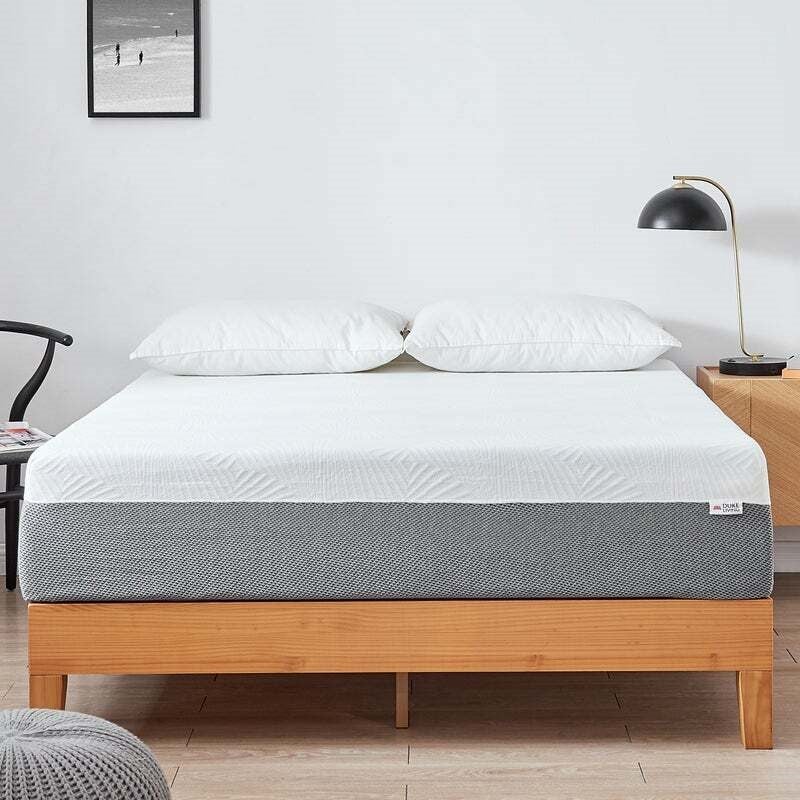 A memory foam mattress on a DukeLiving bed frame
